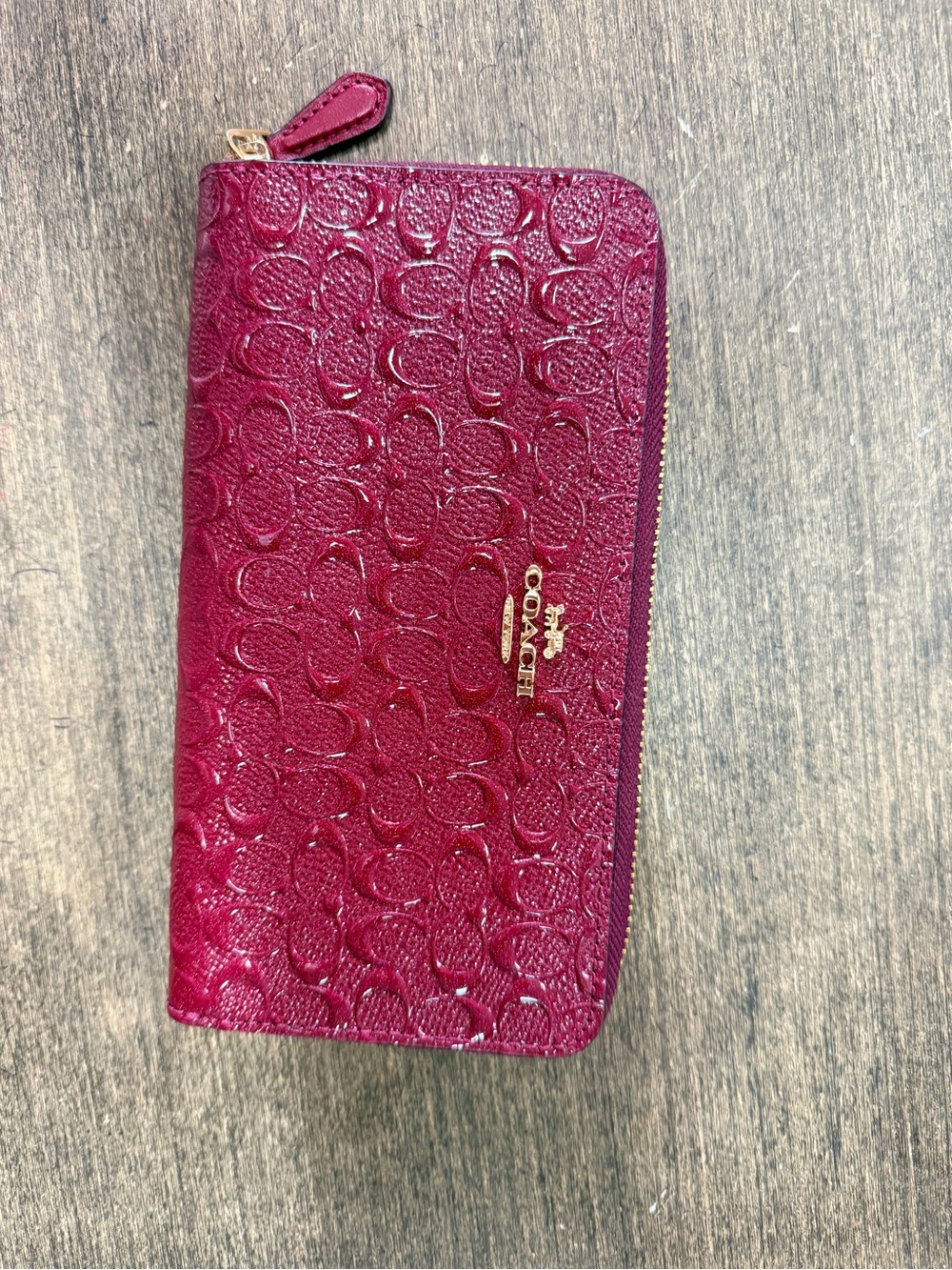 COACH Embossed Signature Zip Wallet in Berry Red